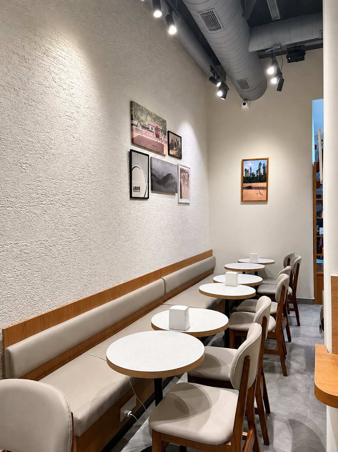 Half Light Coffee Roasters Banquette Seating and Gallery Wall